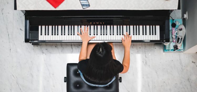 Overhead view of piano student